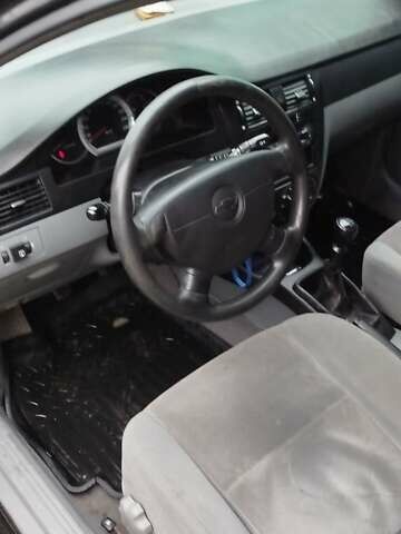 Черный Шевроле Лачетти, объемом двигателя 1.6 л и пробегом 270 тыс. км за 3350 $, фото 4 на Automoto.ua