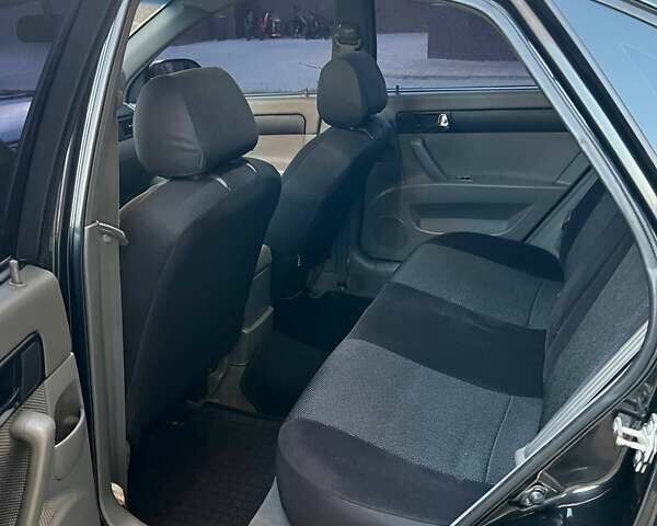 Черный Шевроле Лачетти, объемом двигателя 1.8 л и пробегом 131 тыс. км за 6400 $, фото 51 на Automoto.ua