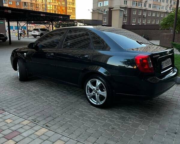 Черный Шевроле Лачетти, объемом двигателя 1.8 л и пробегом 131 тыс. км за 6400 $, фото 21 на Automoto.ua