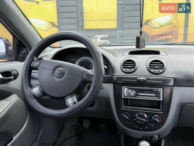 Черный Шевроле Лачетти, объемом двигателя 1.8 л и пробегом 202 тыс. км за 3999 $, фото 29 на Automoto.ua