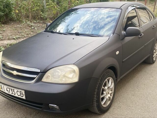 Черный Шевроле Лачетти, объемом двигателя 1.6 л и пробегом 302 тыс. км за 3750 $, фото 7 на Automoto.ua