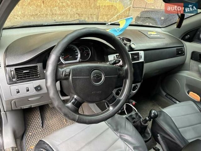 Черный Шевроле Лачетти, объемом двигателя 1.6 л и пробегом 230 тыс. км за 3900 $, фото 4 на Automoto.ua