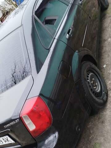 Черный Шевроле Лачетти, объемом двигателя 1.6 л и пробегом 270 тыс. км за 3350 $, фото 10 на Automoto.ua