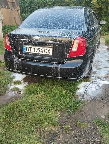 Черный Шевроле Лачетти, объемом двигателя 1.6 л и пробегом 230 тыс. км за 3900 $, фото 8 на Automoto.ua