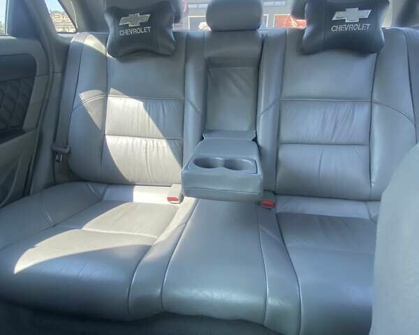 Черный Шевроле Лачетти, объемом двигателя 1.6 л и пробегом 156 тыс. км за 6100 $, фото 8 на Automoto.ua