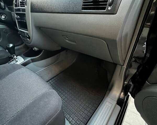 Черный Шевроле Лачетти, объемом двигателя 1.8 л и пробегом 131 тыс. км за 6400 $, фото 47 на Automoto.ua