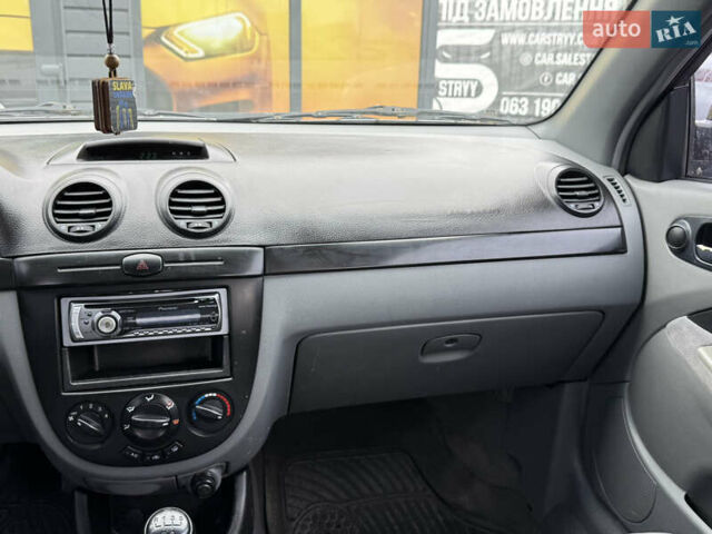 Черный Шевроле Лачетти, объемом двигателя 1.8 л и пробегом 202 тыс. км за 3999 $, фото 30 на Automoto.ua