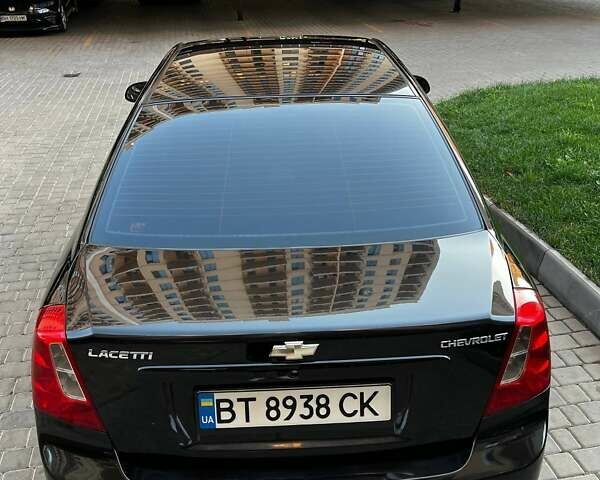 Черный Шевроле Лачетти, объемом двигателя 1.8 л и пробегом 131 тыс. км за 6400 $, фото 6 на Automoto.ua