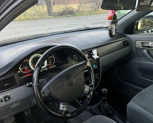 Черный Шевроле Лачетти, объемом двигателя 1.82 л и пробегом 197 тыс. км за 4700 $, фото 18 на Automoto.ua