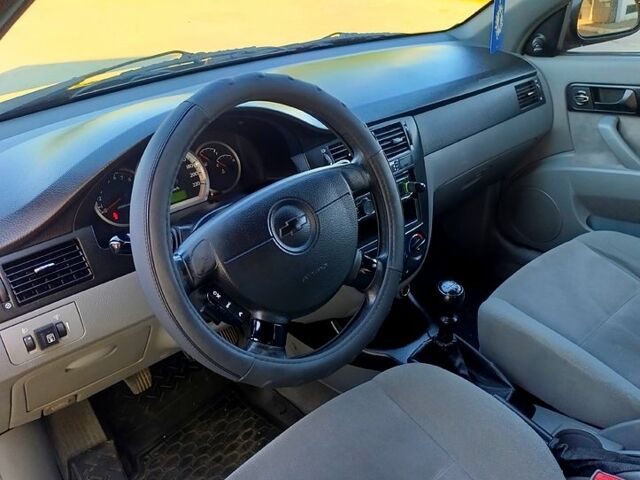 Черный Шевроле Лачетти, объемом двигателя 1.6 л и пробегом 240 тыс. км за 3650 $, фото 6 на Automoto.ua