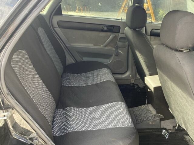 Черный Шевроле Лачетти, объемом двигателя 1.6 л и пробегом 302 тыс. км за 3750 $, фото 3 на Automoto.ua