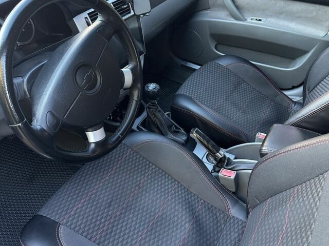 Черный Шевроле Лачетти, объемом двигателя 1.8 л и пробегом 220 тыс. км за 5000 $, фото 7 на Automoto.ua