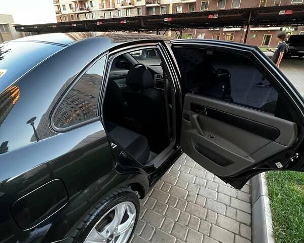 Черный Шевроле Лачетти, объемом двигателя 1.8 л и пробегом 131 тыс. км за 6400 $, фото 54 на Automoto.ua