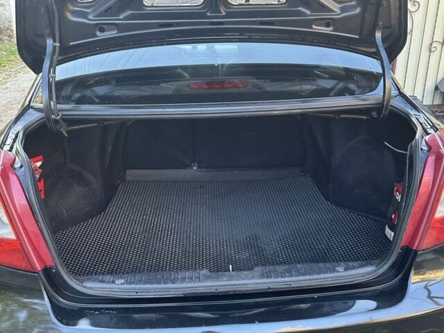 Черный Шевроле Лачетти, объемом двигателя 1.8 л и пробегом 220 тыс. км за 5000 $, фото 2 на Automoto.ua