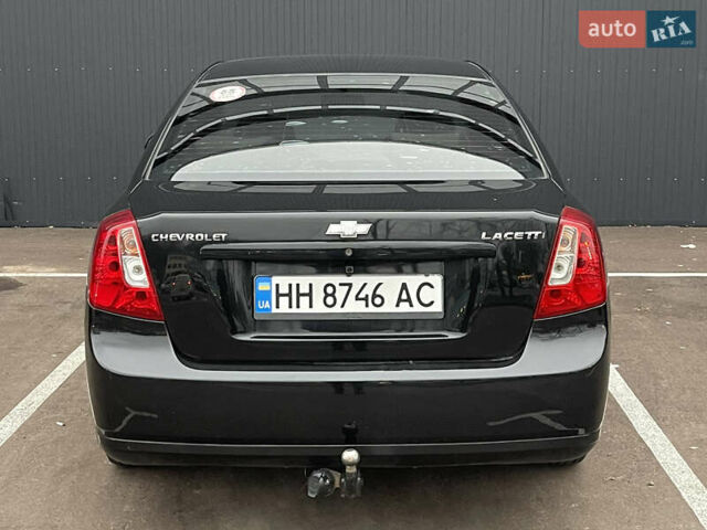 Черный Шевроле Лачетти, объемом двигателя 1.8 л и пробегом 170 тыс. км за 4400 $, фото 3 на Automoto.ua