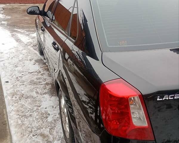Чорний Шевроле Лачетті, об'ємом двигуна 1.8 л та пробігом 208 тис. км за 4000 $, фото 7 на Automoto.ua