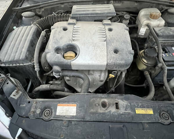 Черный Шевроле Лачетти, объемом двигателя 1.82 л и пробегом 197 тыс. км за 4700 $, фото 10 на Automoto.ua