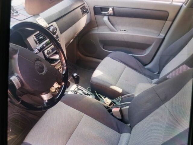 Черный Шевроле Лачетти, объемом двигателя 1.8 л и пробегом 180 тыс. км за 2200 $, фото 2 на Automoto.ua