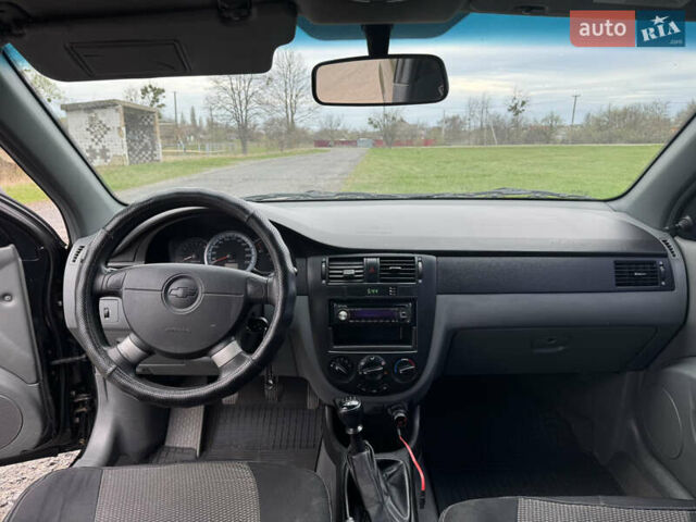 Черный Шевроле Лачетти, объемом двигателя 1.6 л и пробегом 153 тыс. км за 5000 $, фото 8 на Automoto.ua