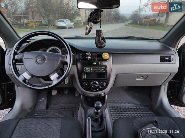 Черный Шевроле Лачетти, объемом двигателя 1.8 л и пробегом 244 тыс. км за 4200 $, фото 20 на Automoto.ua