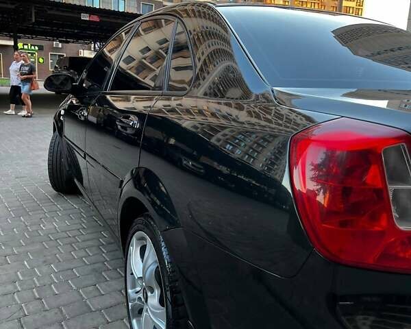 Черный Шевроле Лачетти, объемом двигателя 1.8 л и пробегом 131 тыс. км за 6400 $, фото 7 на Automoto.ua