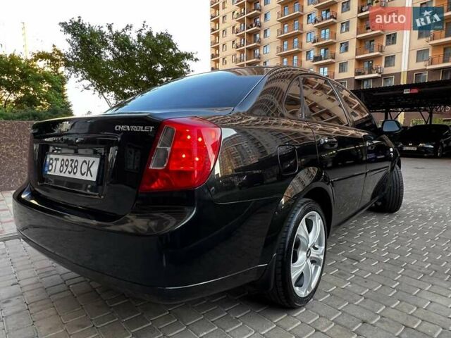 Черный Шевроле Лачетти, объемом двигателя 1.8 л и пробегом 131 тыс. км за 6400 $, фото 35 на Automoto.ua