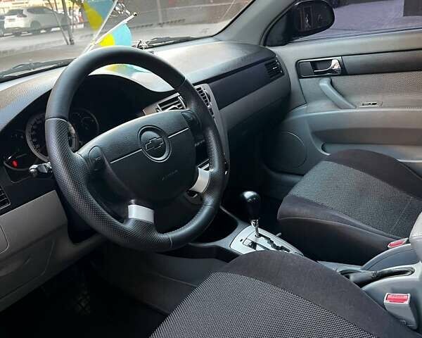 Черный Шевроле Лачетти, объемом двигателя 1.8 л и пробегом 131 тыс. км за 6400 $, фото 58 на Automoto.ua