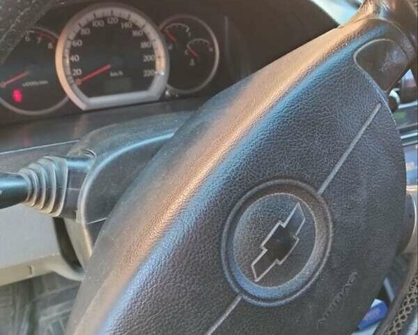 Черный Шевроле Лачетти, объемом двигателя 1.8 л и пробегом 290 тыс. км за 3700 $, фото 4 на Automoto.ua