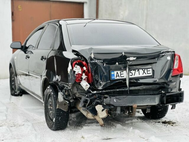 Чорний Шевроле Лачетті, об'ємом двигуна 1.8 л та пробігом 171 тис. км за 1999 $, фото 5 на Automoto.ua