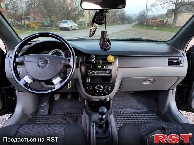 Черный Шевроле Лачетти, объемом двигателя 1.8 л и пробегом 244 тыс. км за 4200 $, фото 11 на Automoto.ua