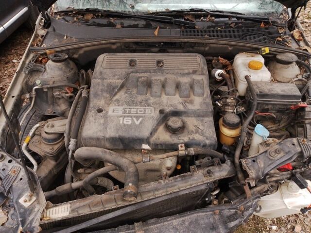 Черный Шевроле Лачетти, объемом двигателя 1.6 л и пробегом 220 тыс. км за 1300 $, фото 2 на Automoto.ua