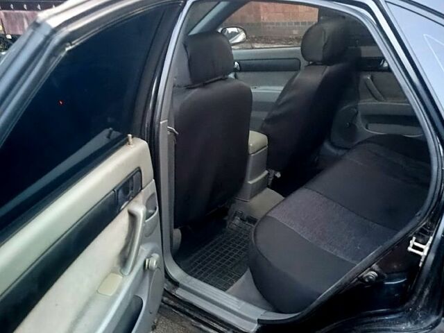 Черный Шевроле Лачетти, объемом двигателя 1.8 л и пробегом 243 тыс. км за 3500 $, фото 6 на Automoto.ua