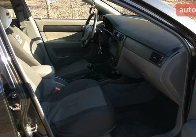 Чорний Шевроле Лачетті, об'ємом двигуна 1.8 л та пробігом 208 тис. км за 5000 $, фото 8 на Automoto.ua