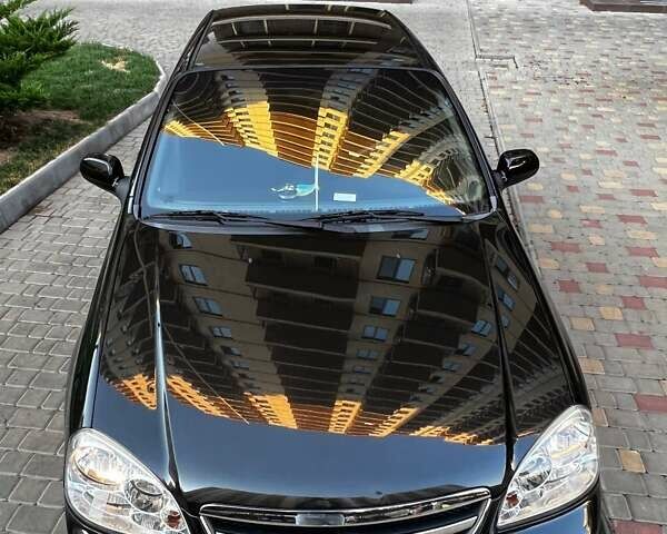 Черный Шевроле Лачетти, объемом двигателя 1.8 л и пробегом 131 тыс. км за 6400 $, фото 31 на Automoto.ua