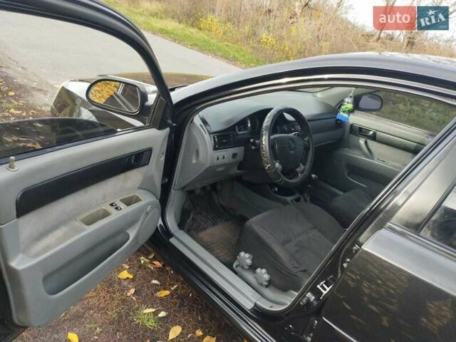Черный Шевроле Лачетти, объемом двигателя 1.6 л и пробегом 190 тыс. км за 3700 $, фото 2 на Automoto.ua