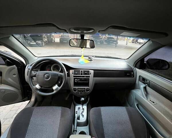 Черный Шевроле Лачетти, объемом двигателя 1.8 л и пробегом 131 тыс. км за 6400 $, фото 52 на Automoto.ua