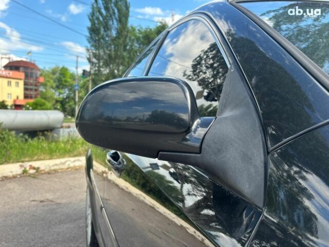 Черный Шевроле Лачетти, объемом двигателя 1.8 л и пробегом 226 тыс. км за 3490 $, фото 9 на Automoto.ua