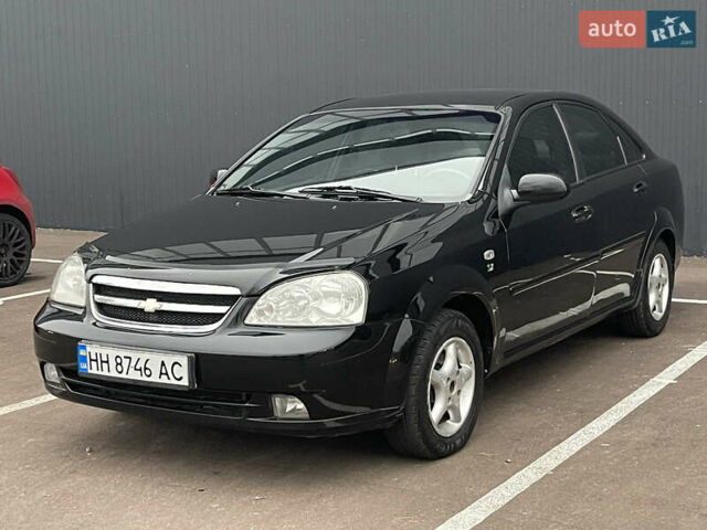 Черный Шевроле Лачетти, объемом двигателя 1.8 л и пробегом 170 тыс. км за 4400 $, фото 1 на Automoto.ua