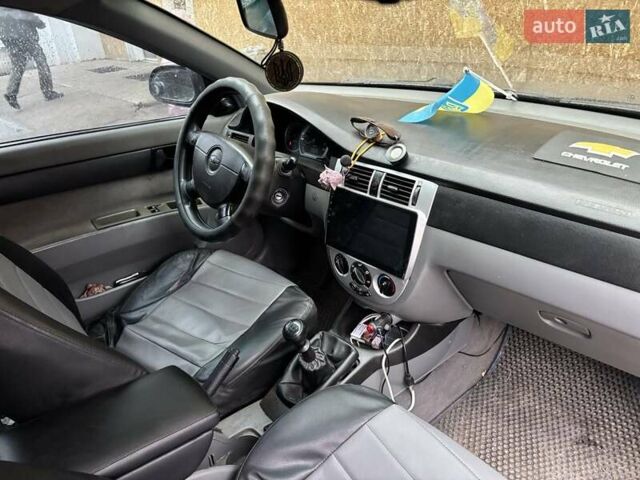 Черный Шевроле Лачетти, объемом двигателя 1.6 л и пробегом 230 тыс. км за 3900 $, фото 1 на Automoto.ua