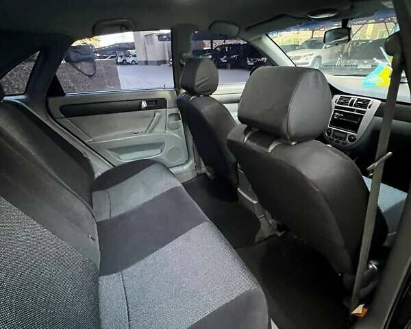 Черный Шевроле Лачетти, объемом двигателя 1.8 л и пробегом 131 тыс. км за 6400 $, фото 53 на Automoto.ua