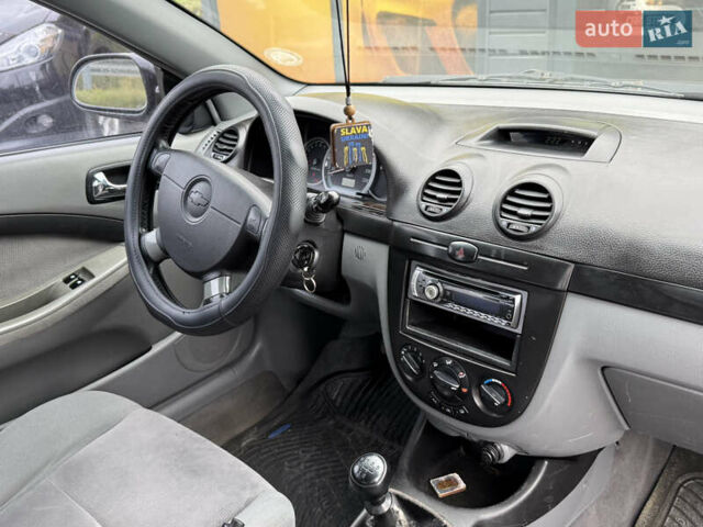 Черный Шевроле Лачетти, объемом двигателя 1.8 л и пробегом 202 тыс. км за 3999 $, фото 25 на Automoto.ua