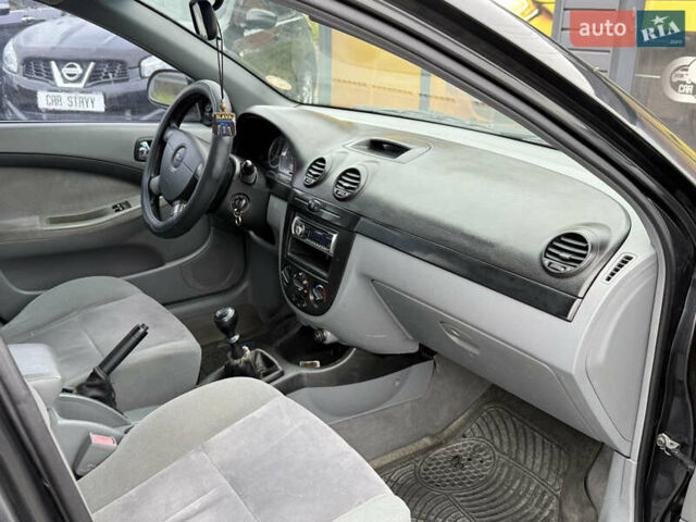 Черный Шевроле Лачетти, объемом двигателя 1.8 л и пробегом 202 тыс. км за 3999 $, фото 27 на Automoto.ua