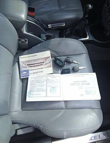 Черный Шевроле Лачетти, объемом двигателя 1.6 л и пробегом 156 тыс. км за 6100 $, фото 15 на Automoto.ua