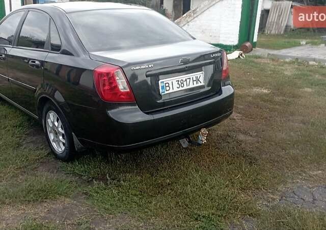 Чорний Шевроле Лачетті, об'ємом двигуна 1.8 л та пробігом 215 тис. км за 5200 $, фото 7 на Automoto.ua