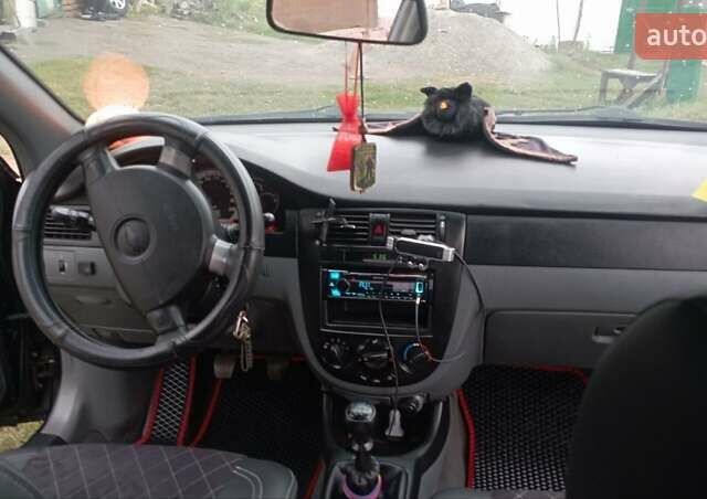 Чорний Шевроле Лачетті, об'ємом двигуна 1.8 л та пробігом 215 тис. км за 5200 $, фото 9 на Automoto.ua