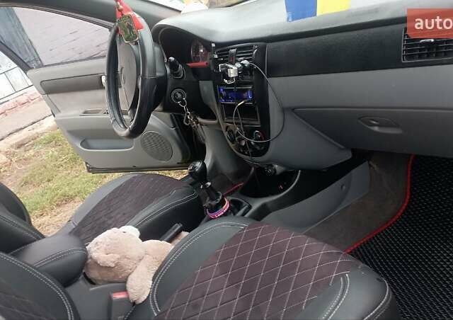 Чорний Шевроле Лачетті, об'ємом двигуна 1.8 л та пробігом 215 тис. км за 5200 $, фото 4 на Automoto.ua
