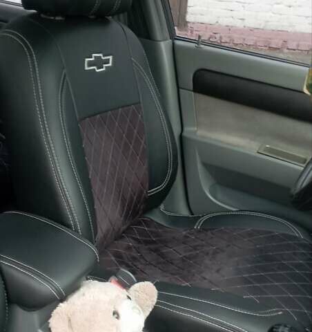 Чорний Шевроле Лачетті, об'ємом двигуна 1.8 л та пробігом 215 тис. км за 5200 $, фото 8 на Automoto.ua