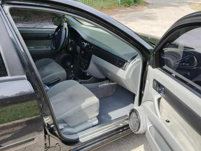 Черный Шевроле Лачетти, объемом двигателя 1.8 л и пробегом 190 тыс. км за 4999 $, фото 12 на Automoto.ua