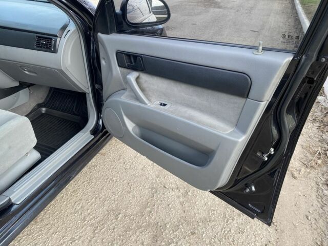 Чорний Шевроле Лачетті, об'ємом двигуна 1.6 л та пробігом 240 тис. км за 4450 $, фото 6 на Automoto.ua