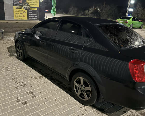 Черный Шевроле Лачетти, объемом двигателя 1.8 л и пробегом 296 тыс. км за 5300 $, фото 4 на Automoto.ua